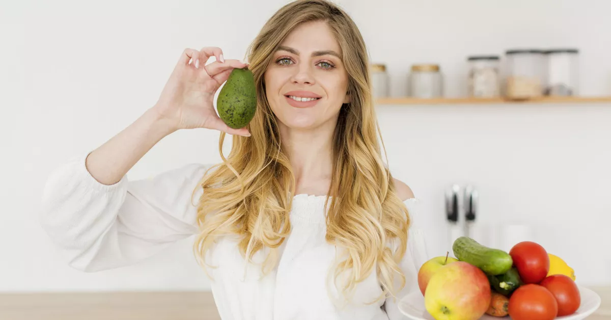 woman-blogger-holding-avocado